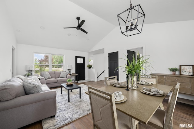 813 Williams Way, Carbon Cliff, IL 61239 - living area with high vaulted ceiling, ceiling fan, a chandelier, and wood finished floors