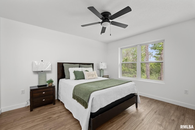 813 Williams Way, Carbon Cliff, IL 61239 - bedroom with wood finished floors and ceiling fan