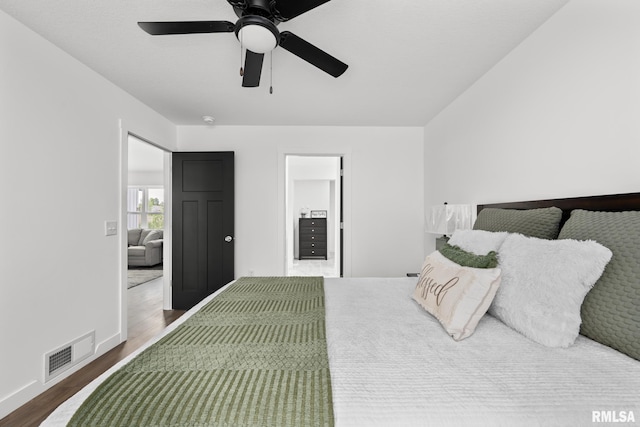 813 Williams Way, Carbon Cliff, IL 61239 - bedroom featuring wood finished floors and ceiling fan