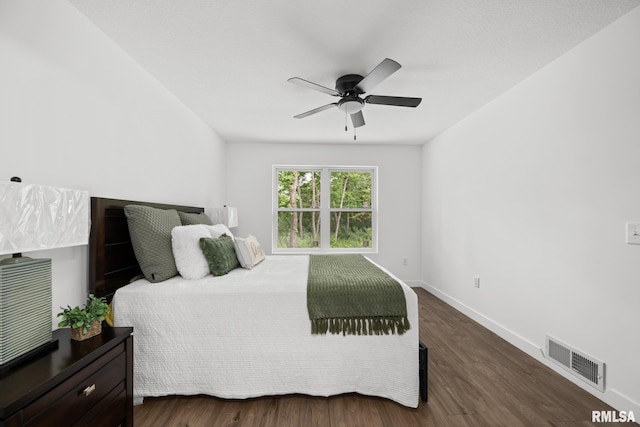 813 Williams Way, Carbon Cliff, IL 61239 - bedroom featuring dark wood-style floors and ceiling fan
