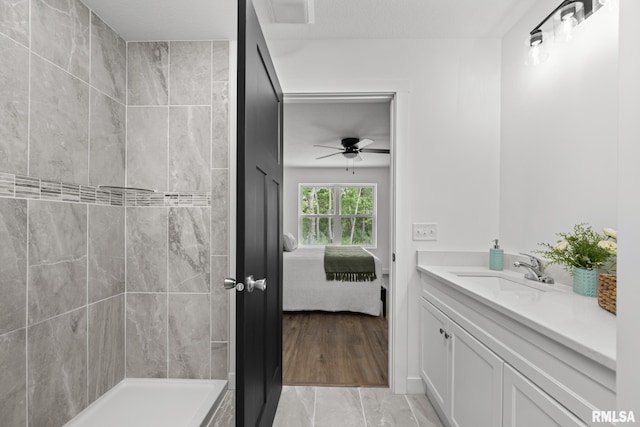 813 Williams Way, Carbon Cliff, IL 61239 - bathroom with ensuite bathroom, vanity, a ceiling fan, and tiled shower