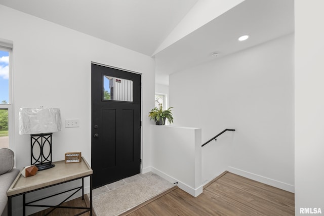 813 Williams Way, Carbon Cliff, IL 61239 - foyer featuring wood finished floors and vaulted ceiling