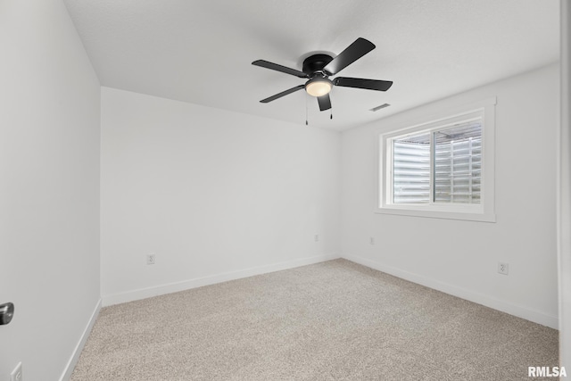 813 Williams Way, Carbon Cliff, IL 61239 - carpeted spare room with ceiling fan and baseboards