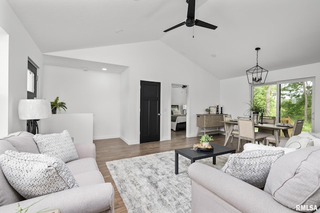 813 Williams Way, Carbon Cliff, IL 61239 - living room with a ceiling fan, a chandelier, wood finished floors, and high vaulted ceiling