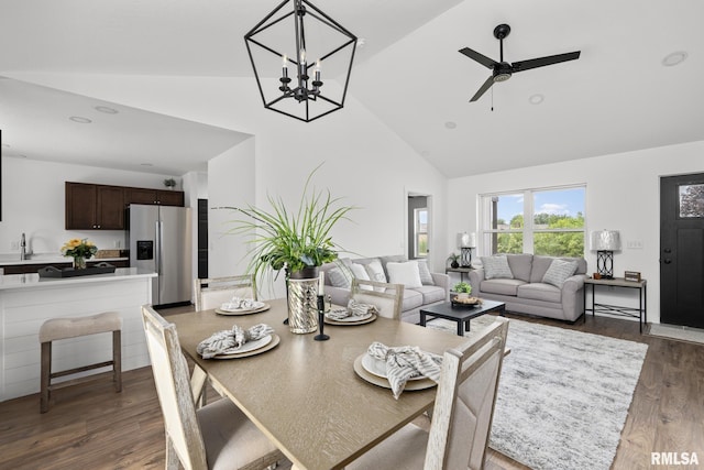 813 Williams Way, Carbon Cliff, IL 61239 - dining room featuring high vaulted ceiling, dark wood-style flooring, ceiling fan, and a chandelier