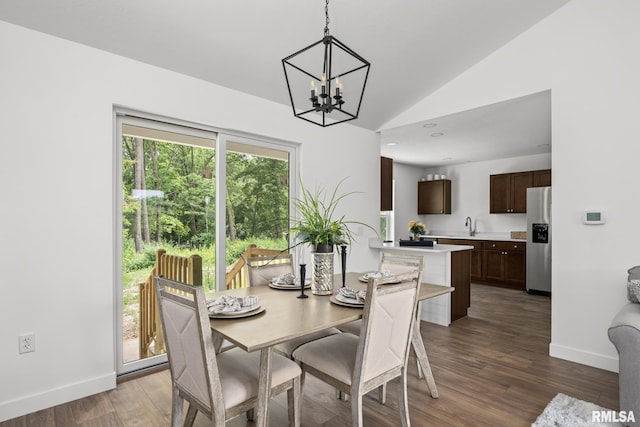 813 Williams Way, Carbon Cliff, IL 61239 - dining area with a chandelier, dark wood-type flooring, and lofted ceiling