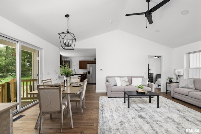 813 Williams Way, Carbon Cliff, IL 61239 - living area featuring ceiling fan, vaulted ceiling, a chandelier, and wood finished floors