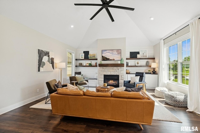 6925 Grover Sta, Bettendorf, IA 52722 - living room featuring a fireplace, high vaulted ceiling, dark wood-style flooring, a ceiling fan, and recessed lighting