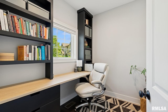 6925 Grover Sta, Bettendorf, IA 52722 - home office with built in study area and baseboards