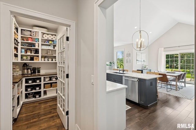 6925 Grover Sta, Bettendorf, IA 52722 - kitchen with dishwasher, dark wood-type flooring, gray cabinetry, healthy amount of natural light, and lofted ceiling