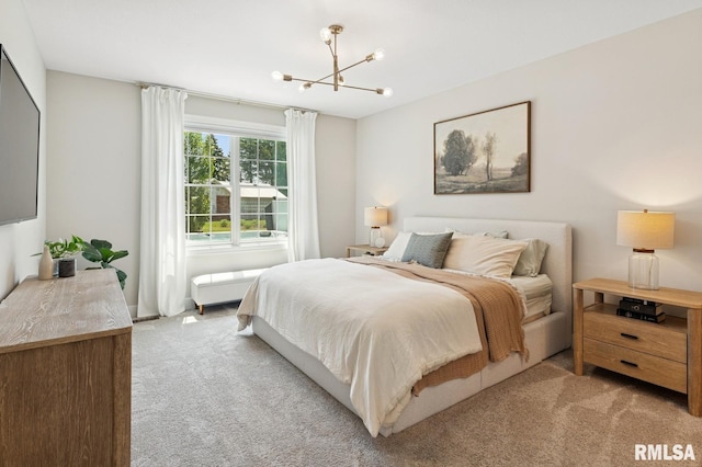 6925 Grover Sta, Bettendorf, IA 52722 - bedroom with light colored carpet and a chandelier