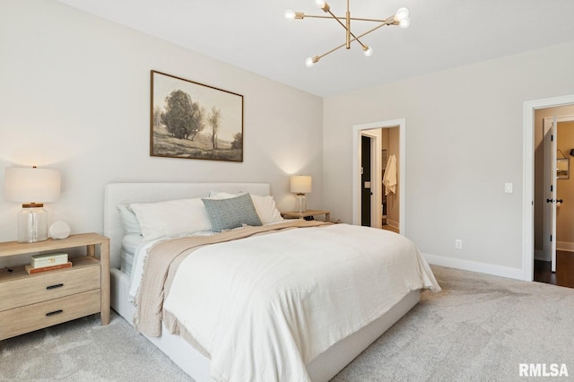 6925 Grover Sta, Bettendorf, IA 52722 - bedroom featuring a chandelier and carpet floors