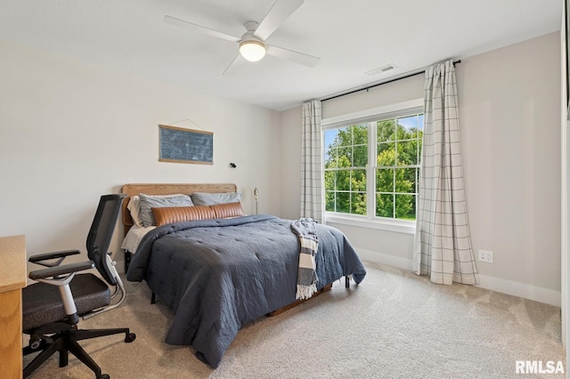6925 Grover Sta, Bettendorf, IA 52722 - bedroom featuring carpet, ceiling fan, and an office area