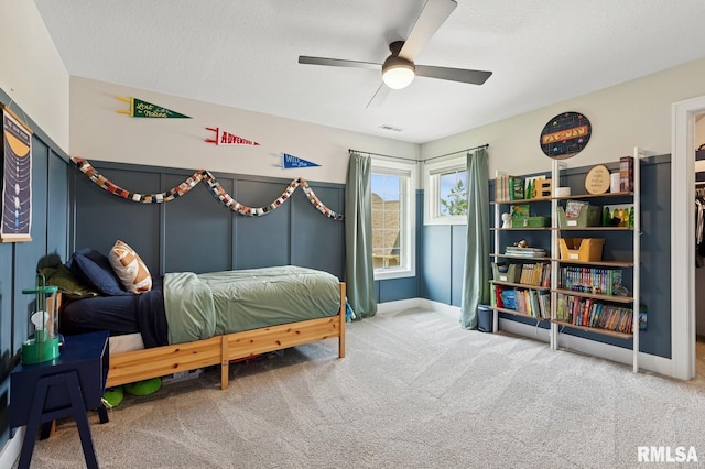 6925 Grover Sta, Bettendorf, IA 52722 - carpeted bedroom with ceiling fan and a textured ceiling