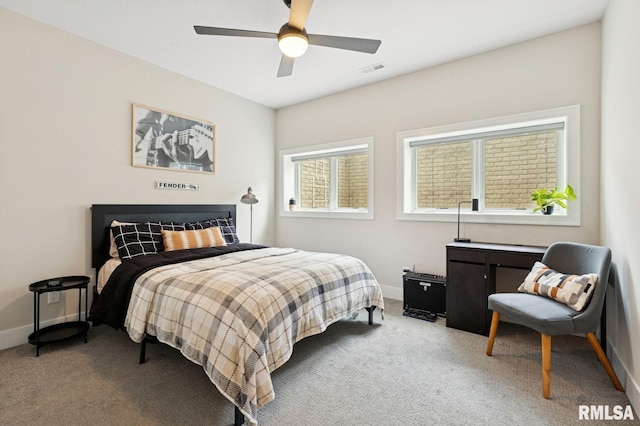 6925 Grover Sta, Bettendorf, IA 52722 - bedroom with light colored carpet and ceiling fan