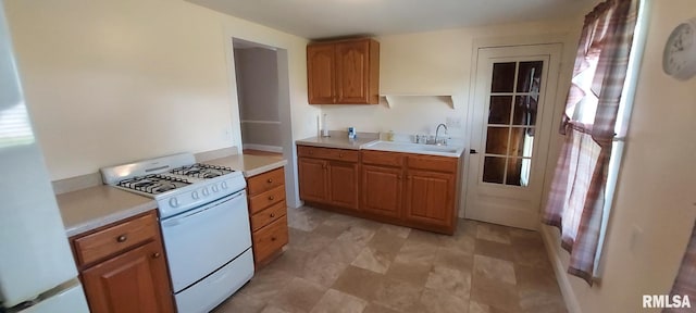 304 2nd St, Matherville, IL 61263 - kitchen featuring white appliances, light countertops, and healthy amount of natural light
