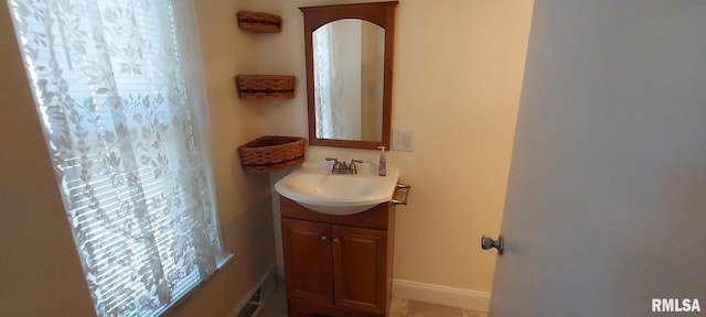 304 2nd St, Matherville, IL 61263 - bathroom with vanity and tile patterned floors