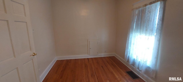 304 2nd St, Matherville, IL 61263 - spare room with wood finished floors and baseboards