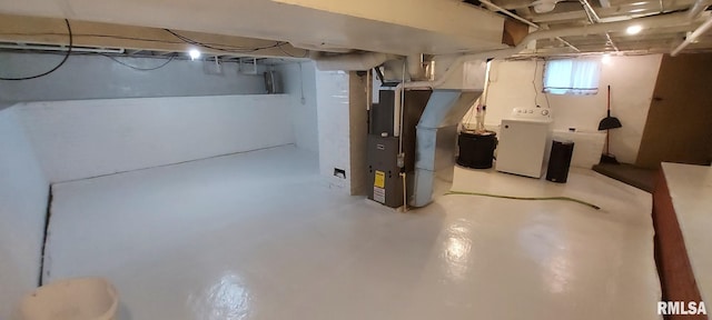 304 2nd St, Matherville, IL 61263 - basement featuring washer / clothes dryer and heating unit