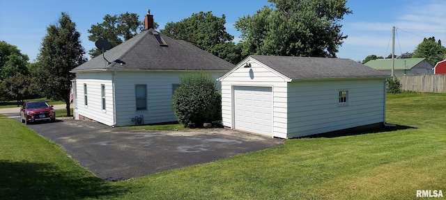 304 2nd St, Matherville, IL 61263 - detached garage featuring asphalt driveway