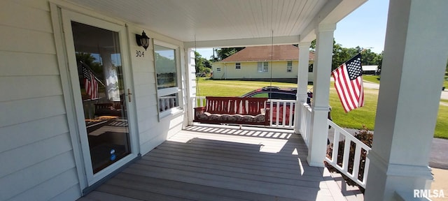 304 2nd St, Matherville, IL 61263 - porch featuring a yard