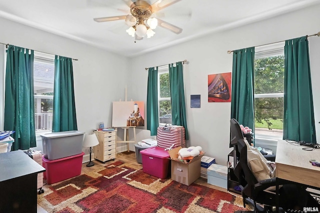 1020 Brown St, Bettendorf, IA 52722 - office with a ceiling fan and plenty of natural light