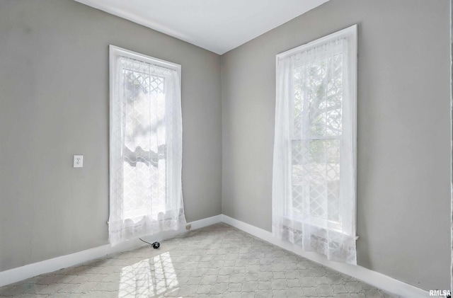 1703 20th St, Rock Island, IL 61201 - spare room with plenty of natural light