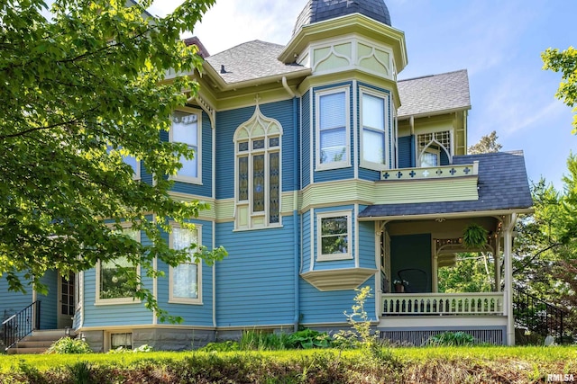 1703 20th St, Rock Island, IL 61201 - victorian house featuring a shingled roof