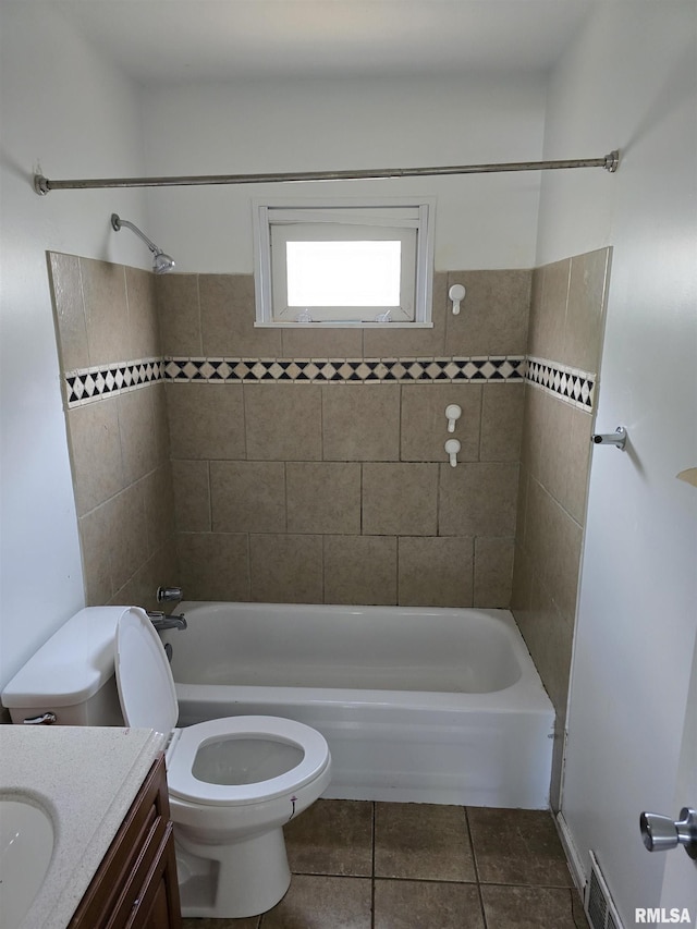 2505 Cody St, Bettendorf, IA 52722 - bathroom featuring vanity, tile patterned floors, and shower / bathtub combination
