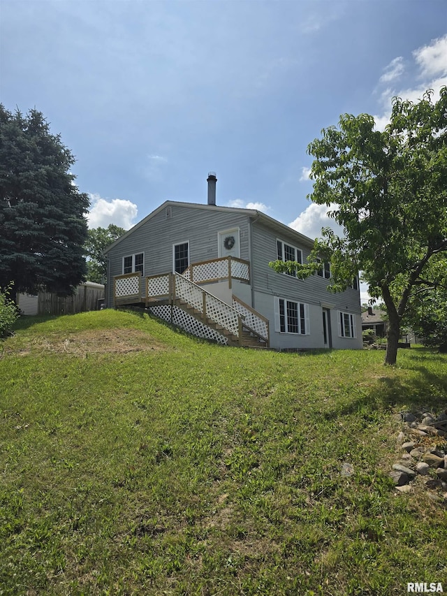 2505 Cody St, Bettendorf, IA 52722 - rear view of property with stairway and a wooden deck
