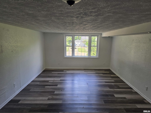 2505 Cody St, Bettendorf, IA 52722 - unfurnished room featuring a textured wall, a textured ceiling, and wood finished floors