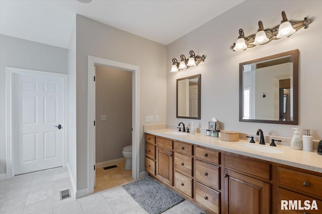 5985 Eagle Ridge Rd, Bettendorf, IA 52722 - full bath with double vanity and tile patterned floors