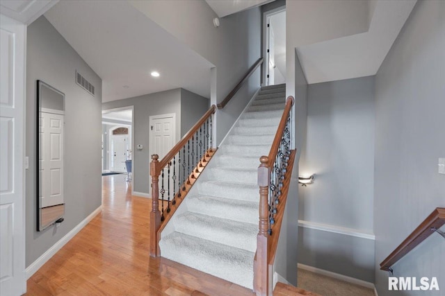 5985 Eagle Ridge Rd, Bettendorf, IA 52722 - stairway with wood finished floors and recessed lighting
