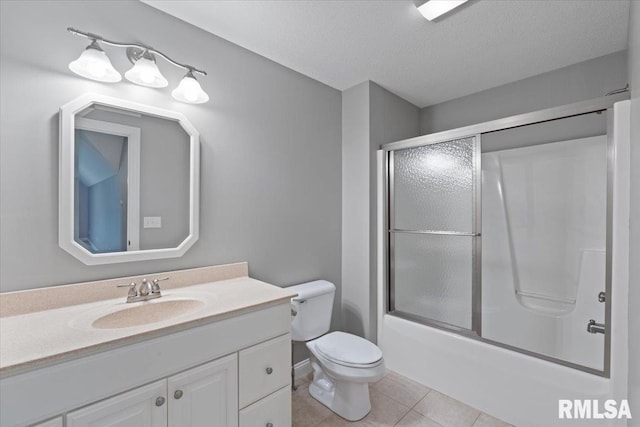 5985 Eagle Ridge Rd, Bettendorf, IA 52722 - bathroom featuring vanity, shower / bath combination with glass door, and tile patterned flooring