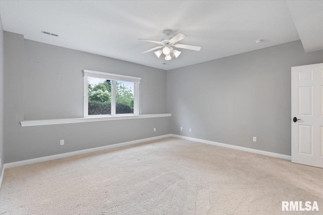 5985 Eagle Ridge Rd, Bettendorf, IA 52722 - carpeted empty room featuring ceiling fan and a smoke detector