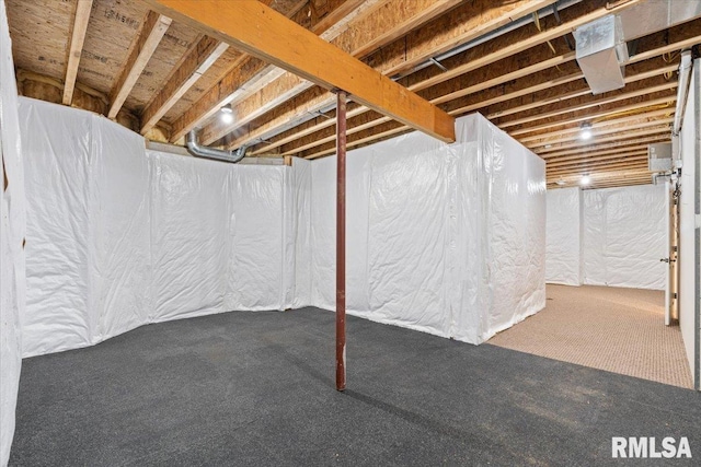 5985 Eagle Ridge Rd, Bettendorf, IA 52722 - unfinished below grade area featuring carpet flooring