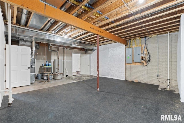 5985 Eagle Ridge Rd, Bettendorf, IA 52722 - unfinished below grade area featuring electric panel and water heater