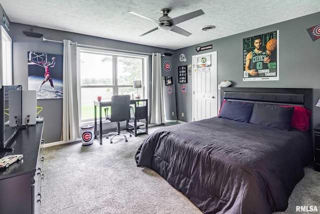 1514 E Willow Dr, Marion, IL 62959 - bedroom featuring a textured ceiling, ceiling fan, an office area, and carpet