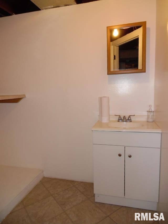 1444 Prospect Ave, Clinton, IA 52732 - bathroom with vanity and tile patterned floors