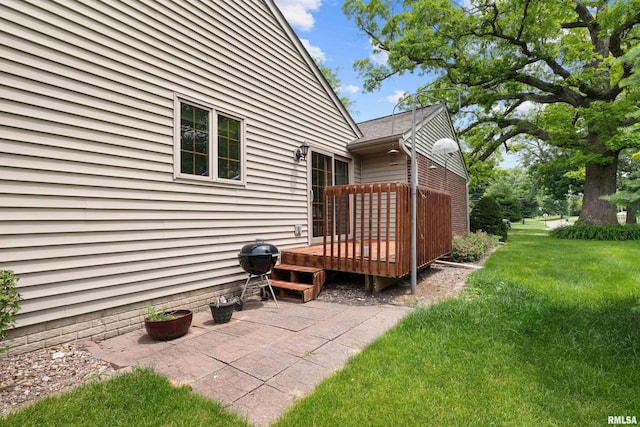 10 Briarwood Ln Unit 10, Rock Island, IL 61201 - exterior space with a deck, a yard, and a patio area