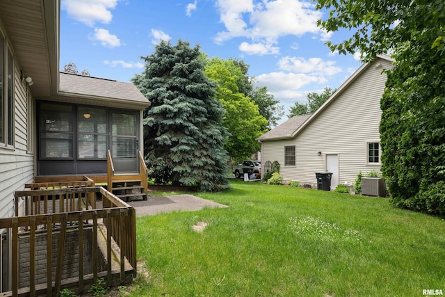 10 Briarwood Ln Unit 10, Rock Island, IL 61201 - view of grassy yard with a sunroom