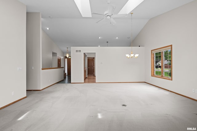 10 Briarwood Ln Unit 10, Rock Island, IL 61201 - spare room featuring high vaulted ceiling, light colored carpet, a chandelier, ceiling fan, and a skylight