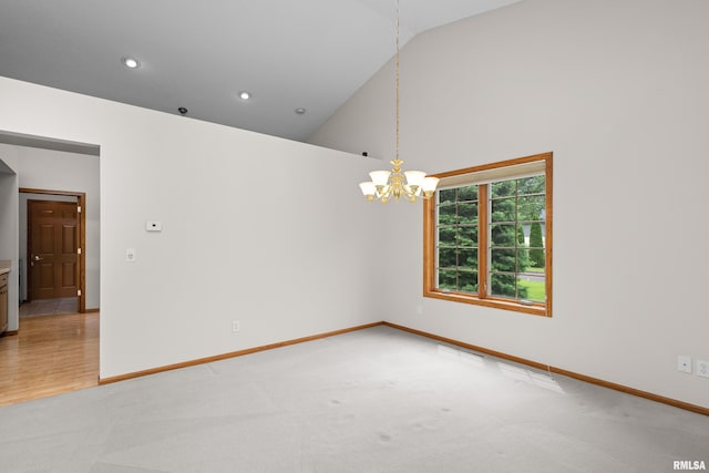 10 Briarwood Ln Unit 10, Rock Island, IL 61201 - empty room featuring a chandelier, light carpet, high vaulted ceiling, and recessed lighting