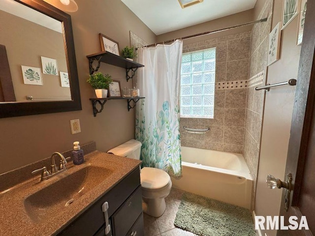 611 13th St, De Witt, IA 52742 - full bath featuring vanity, shower / tub combo, and tile patterned floors