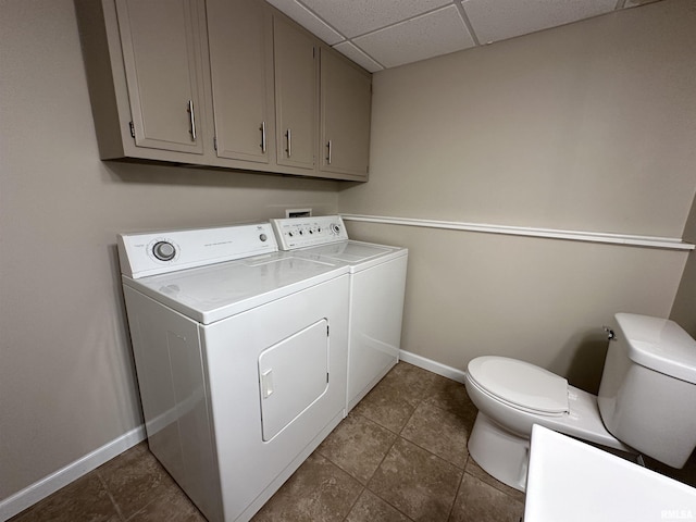 70 Carriage Hl, Macomb, IL 61455 - laundry room with independent washer and dryer and dark tile patterned flooring