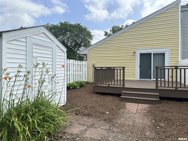 70 Carriage Hl, Macomb, IL 61455 - view of yard featuring a storage shed and a deck