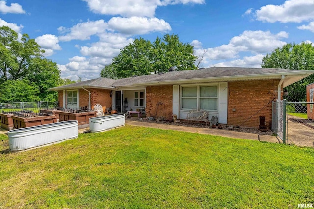 1278 Nicklaus Ln, Marion, IL 62959 - rear view of property featuring a garden and brick siding