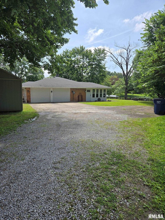1278 Nicklaus Ln, Marion, IL 62959 - garage featuring driveway