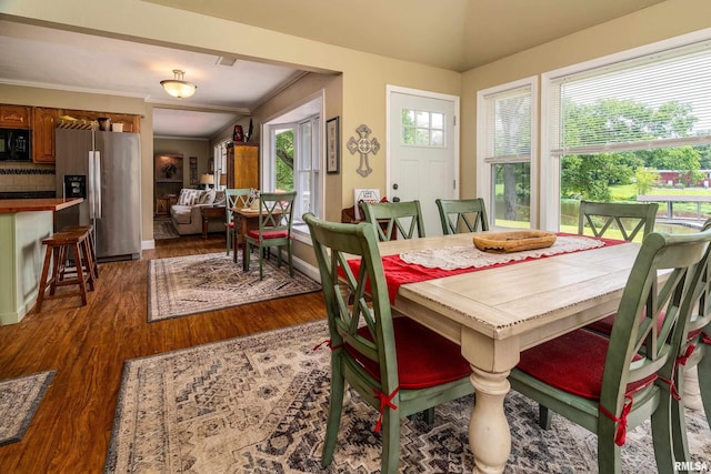 1278 Nicklaus Ln, Marion, IL 62959 - dining space with dark wood finished floors, vaulted ceiling, and ornamental molding