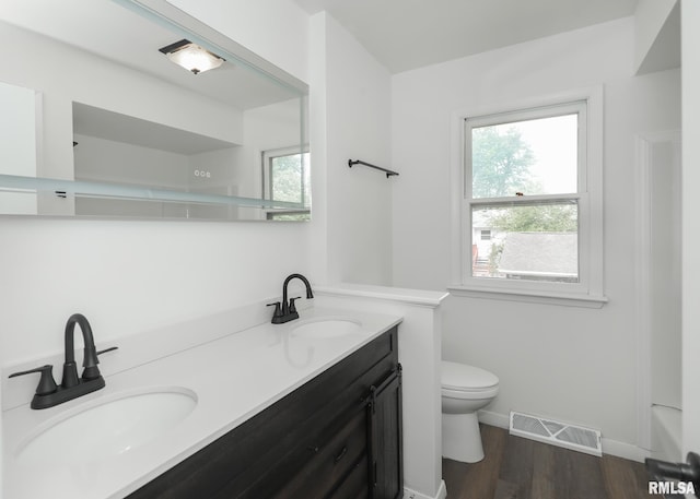 3503 36th St, Moline, IL 61265 - full bathroom featuring double vanity and wood finished floors